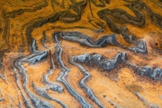 Ochre curves at the waterside
